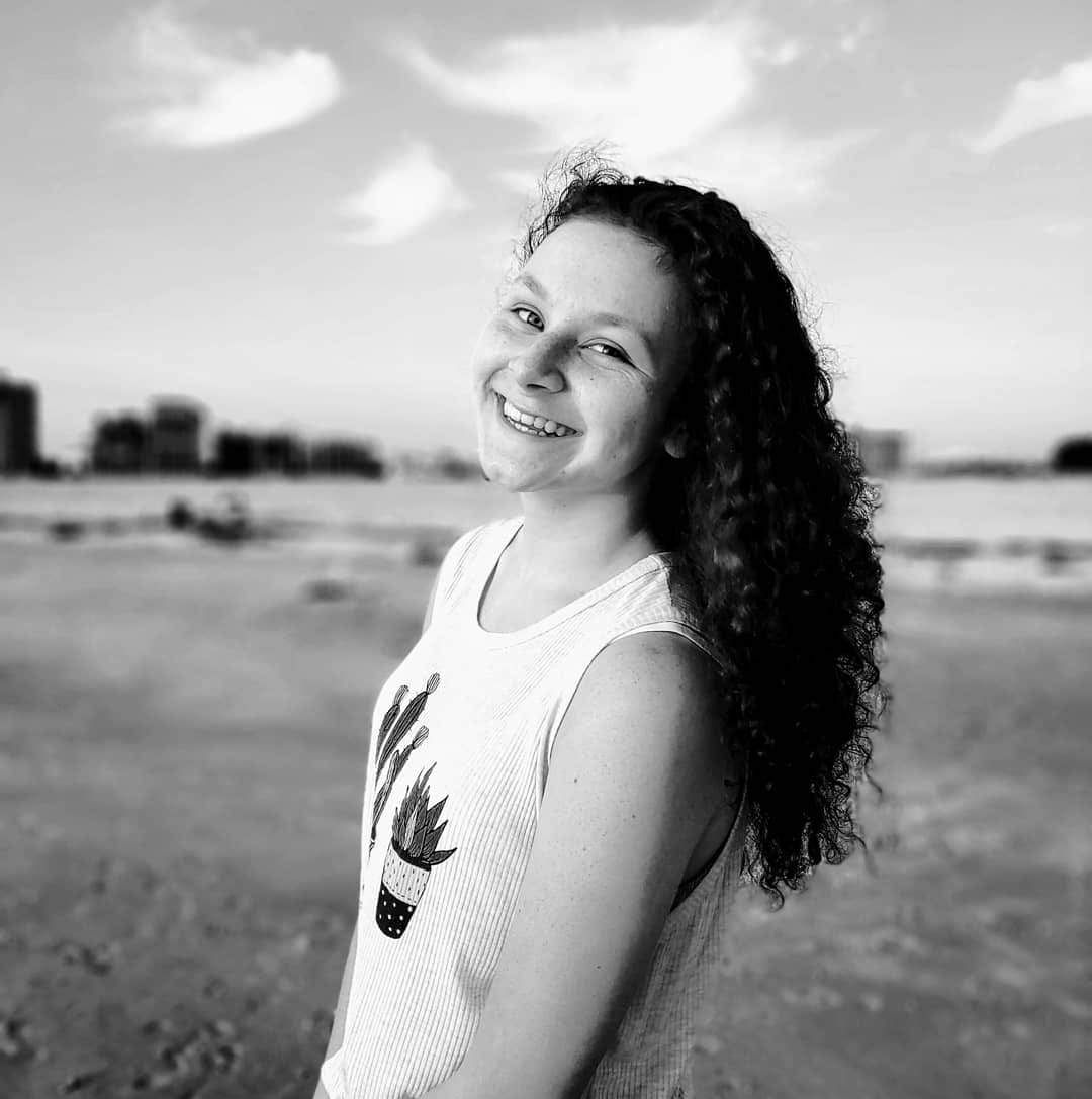 Black And White Head Shot Of Nadia Wescomb Smiling