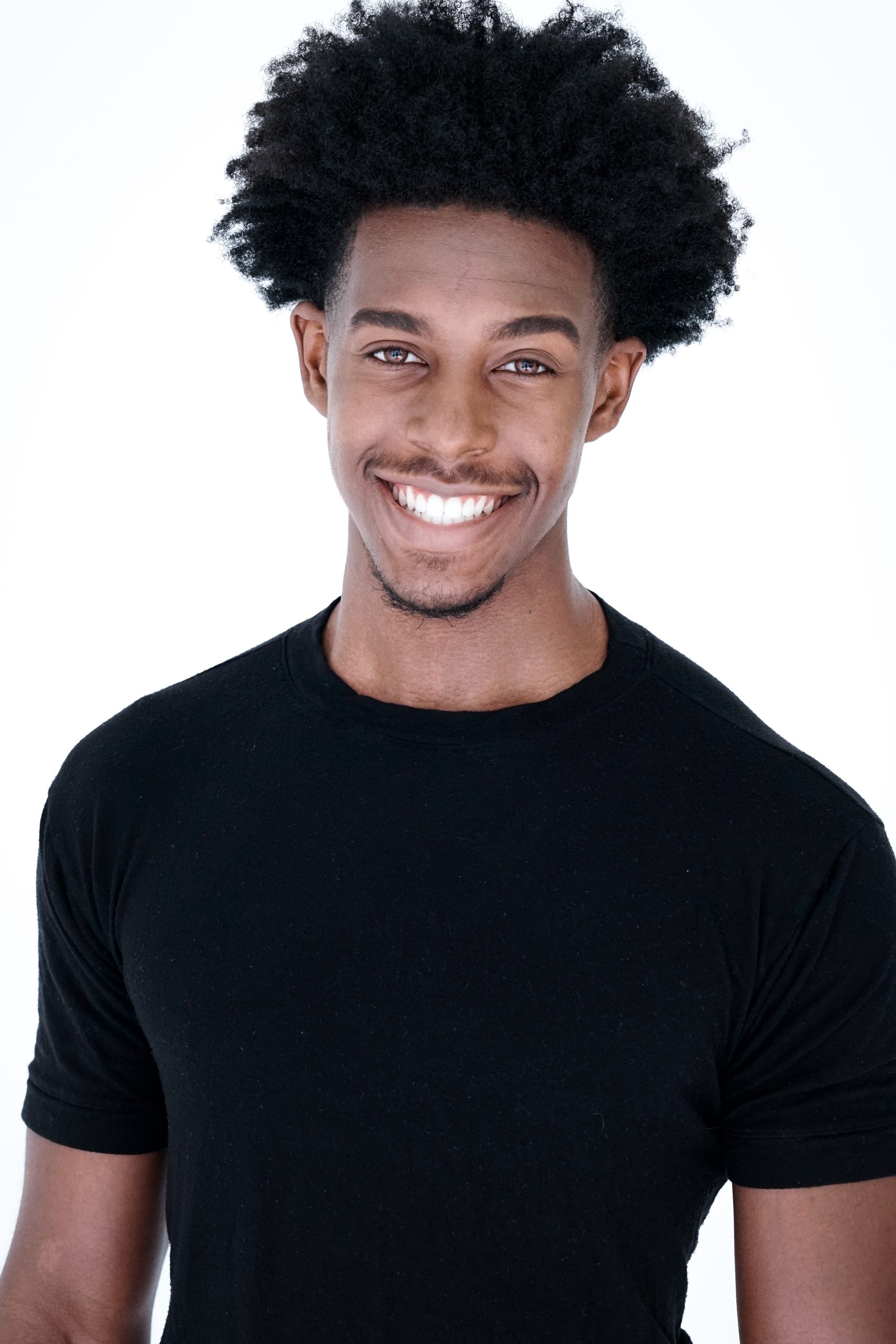 Modeling Head Shot Of Tariq Smiling